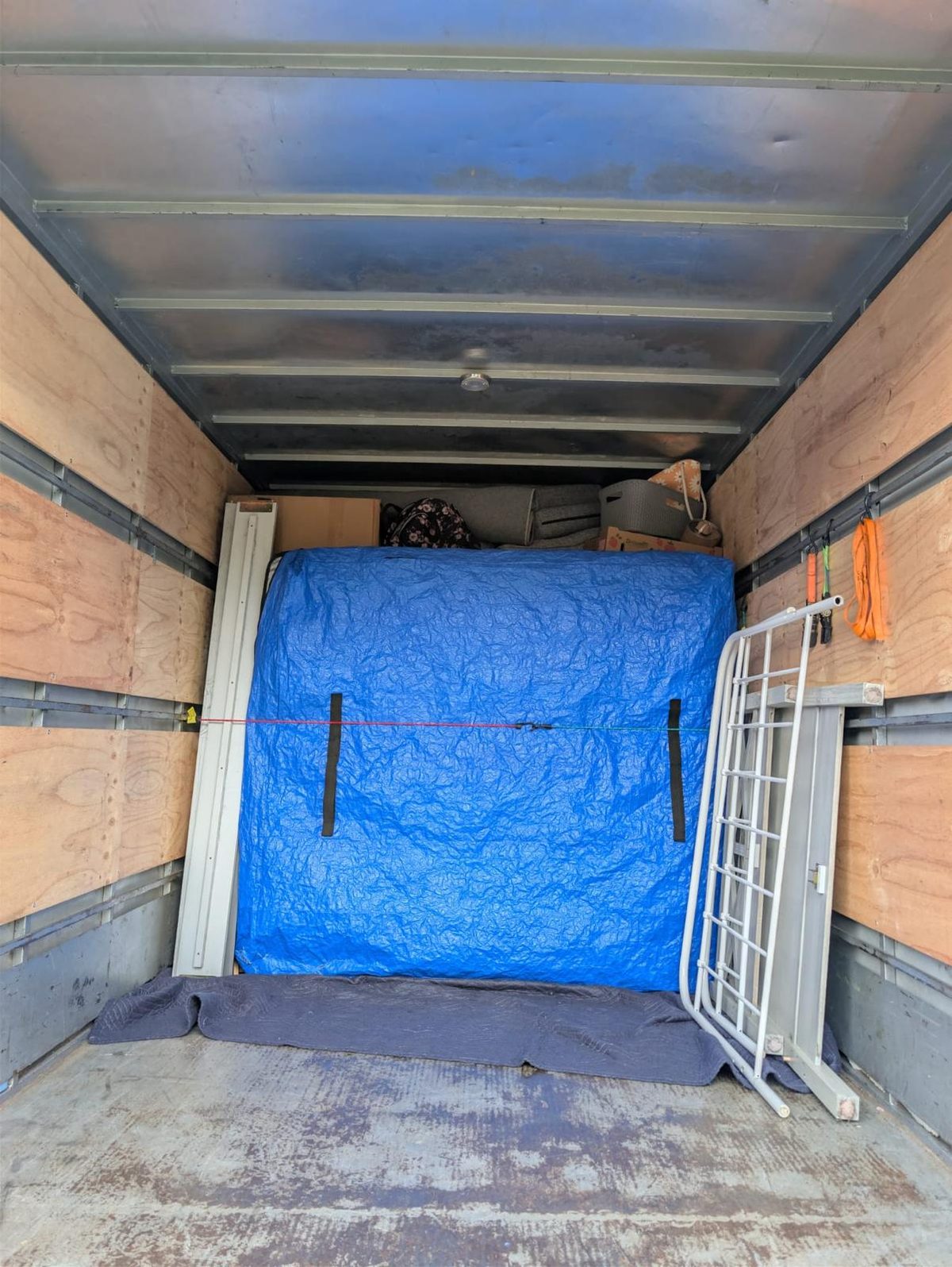 Truck interior with protected mattress